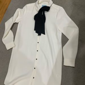 Shirt dress with bow.